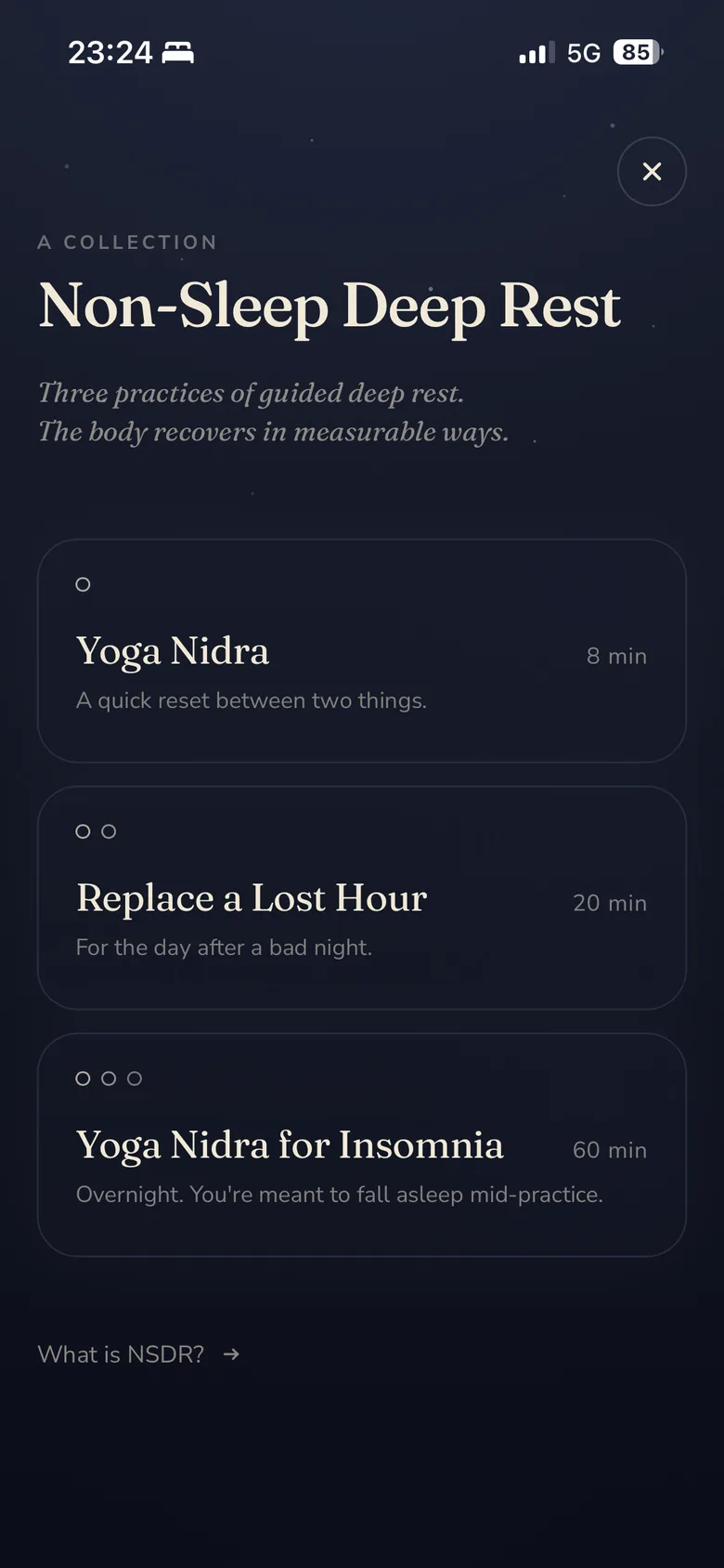 Stillee's Non-Sleep Deep Rest collection on iPhone, listing three practices — Yoga Nidra at eight minutes, Replace a Lost Hour at twenty minutes, and Yoga Nidra for Insomnia overnight, with a note that you're meant to fall asleep mid-practice.
